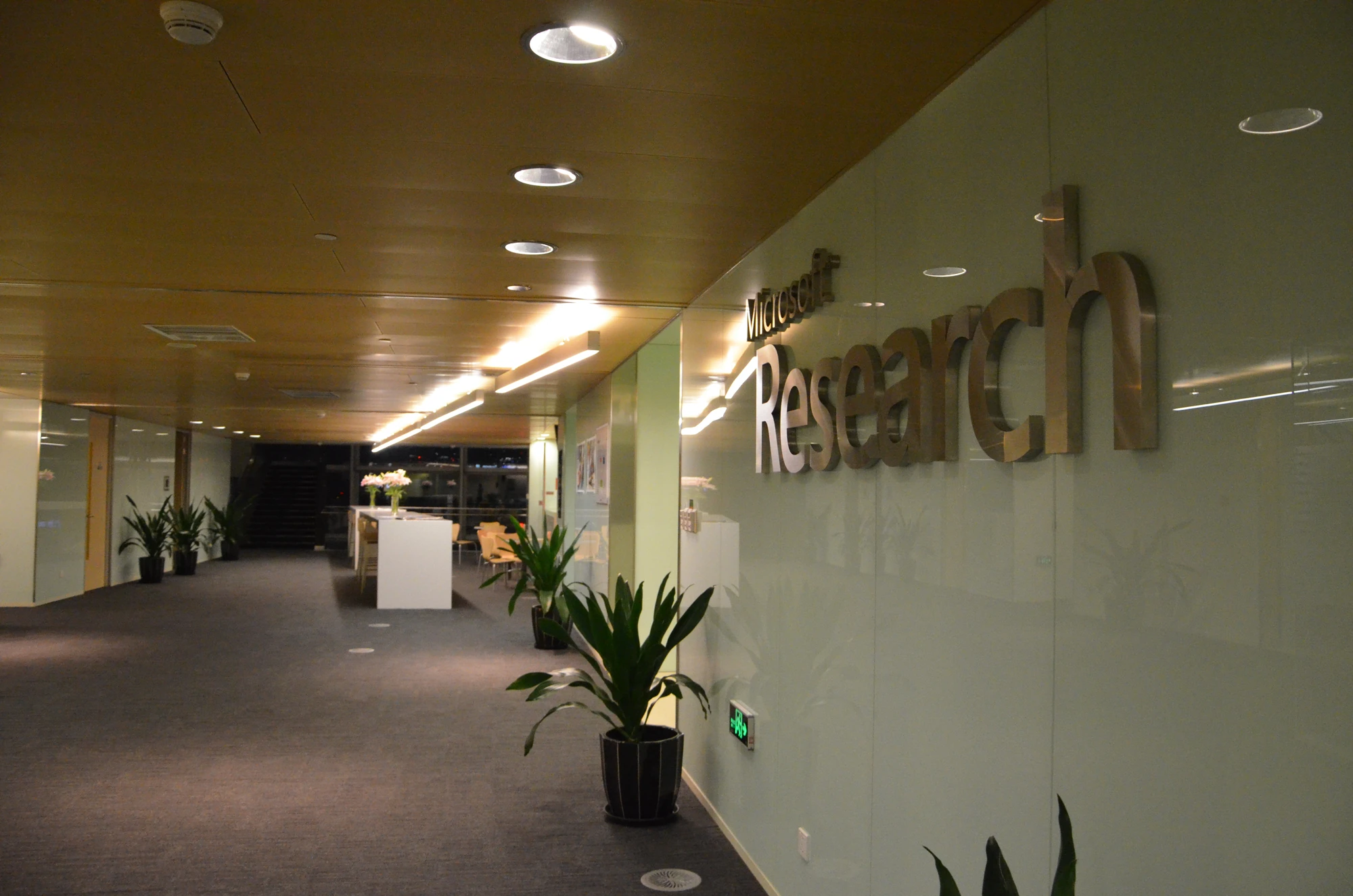 Microsoft Research lettering on a glass wall inside its Beijing office.